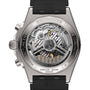 The back of the Breitling Chronomat B01 42 showcases its exposed mechanical movement, intricate gears, and engraved details, all paired with a stylish black rubber strap.