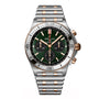 The Breitling Chronomat B01 42 is a two-tone stainless steel and gold chronograph with a green dial, three subdials, COSC-certified precision, and a date display on a metal bracelet.
