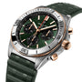 The Breitling Chronomat B01 42 features a green dial with three subdials, gold and silver accents, and a textured green strap.