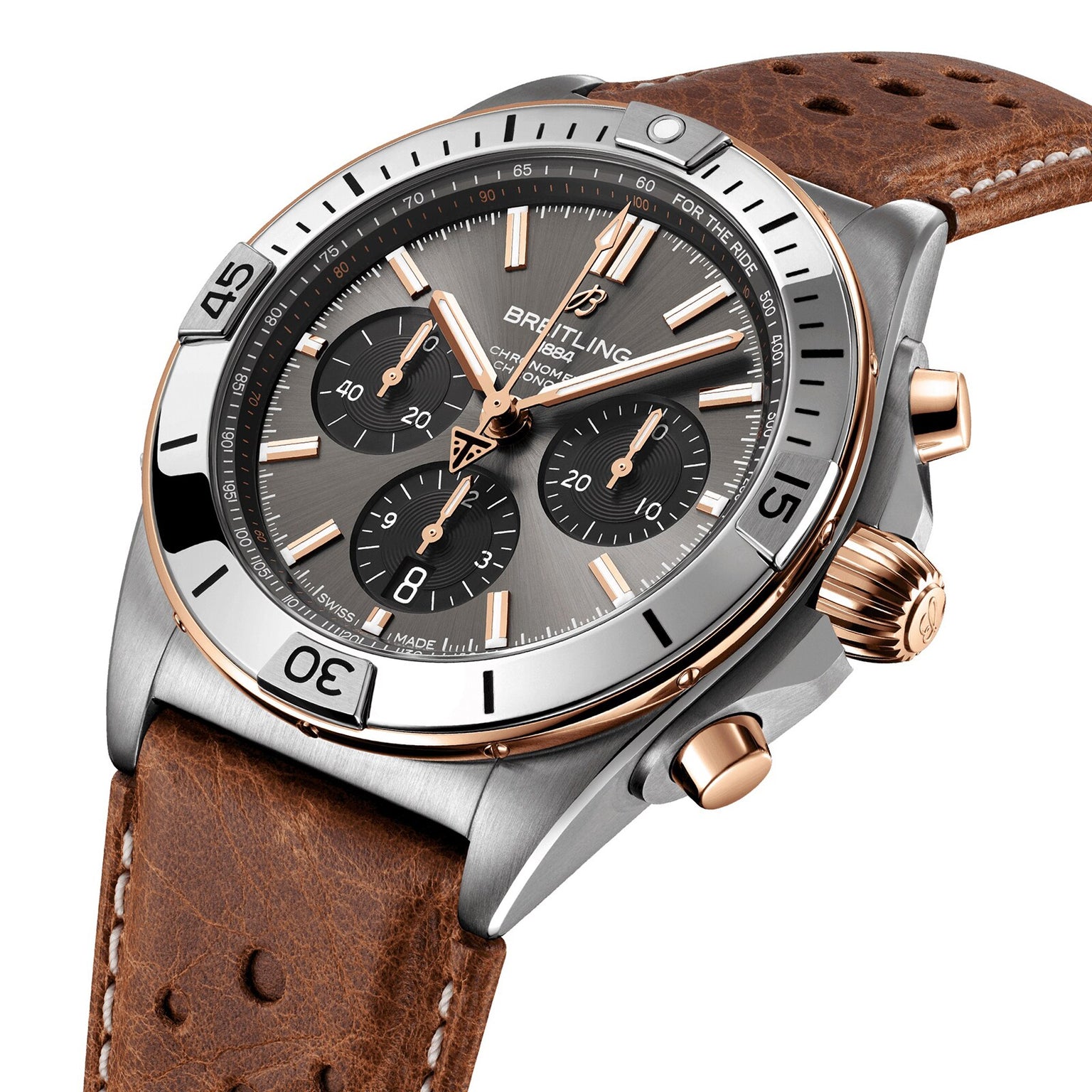 The Breitling Chronomat B01 42 Triumph is a chronograph watch with a brown leather strap and a black dial featuring gold accents.