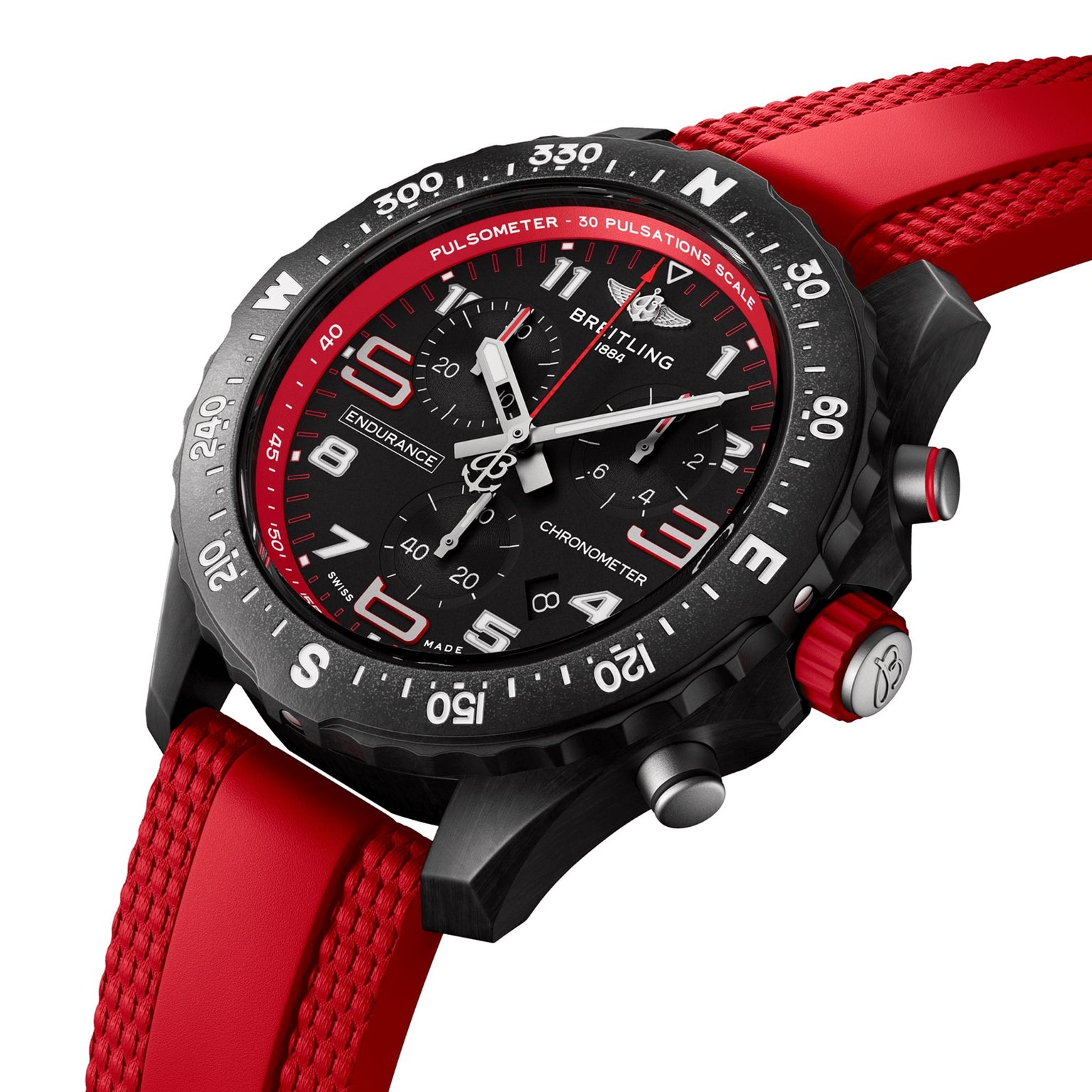 The Breitling Endurance Pro 38 is a black chronograph athleisure watch with an ultra-light Breitlight case, red bezel and strap, plus white dial numbers—ideal for sporty lifestyles. Shown on a white background.