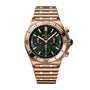 Breitling Chronomat B01 42 wristwatch in gold-tone with a green dial, three subdials, mechanical chronograph, date window at 6 o’clock, and metal link bracelet.