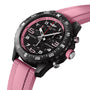The Breitling Endurance Pro 38 is an athleisure watch in black and pink, featuring a textured pink rubber strap, durable Breitlight case, and a sleek black bezel.