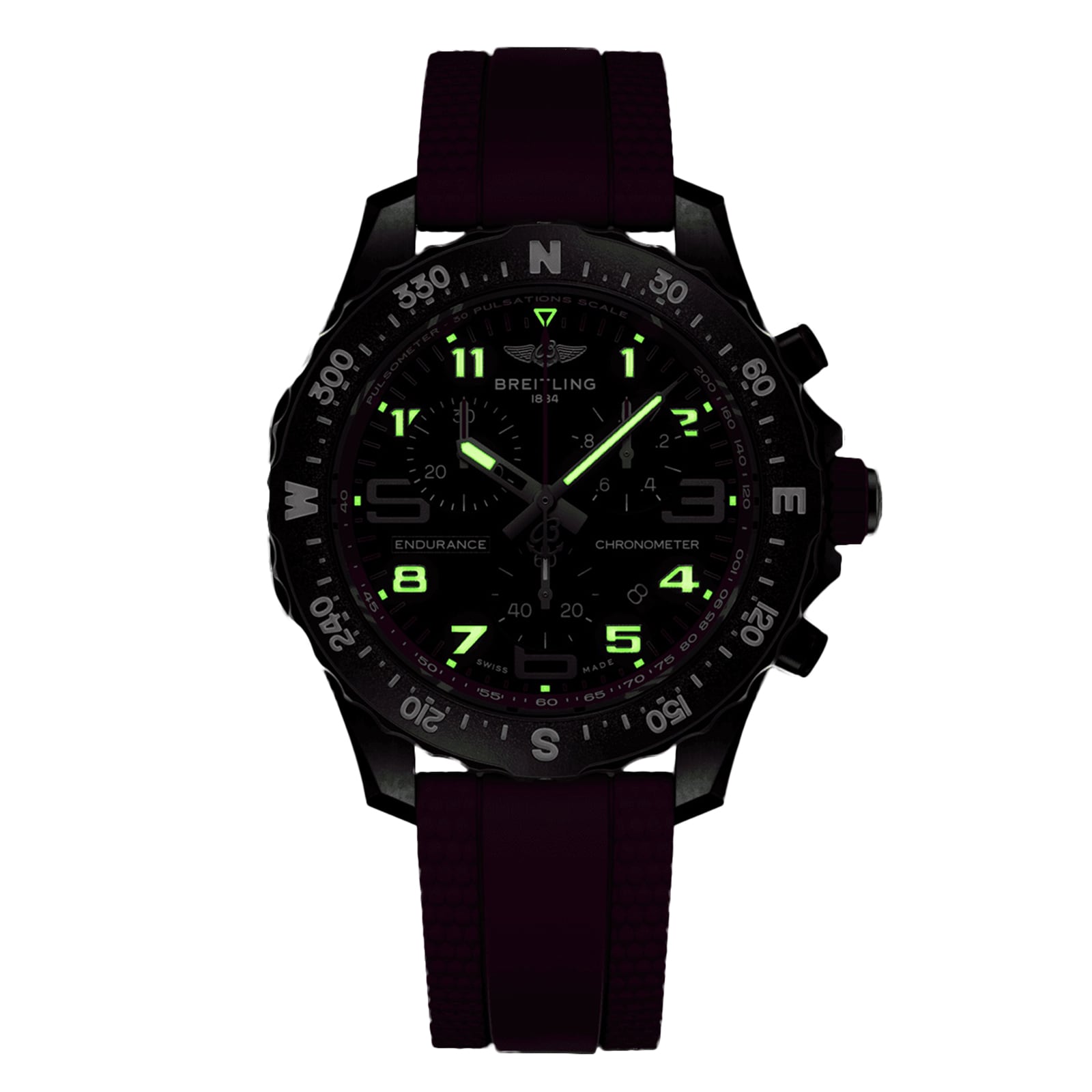 A black Breitling Endurance Pro 38 watch with a rubber strap, luminous green numbers and hands, compass bezel, and lightweight Breitlight case is displayed against a white background.