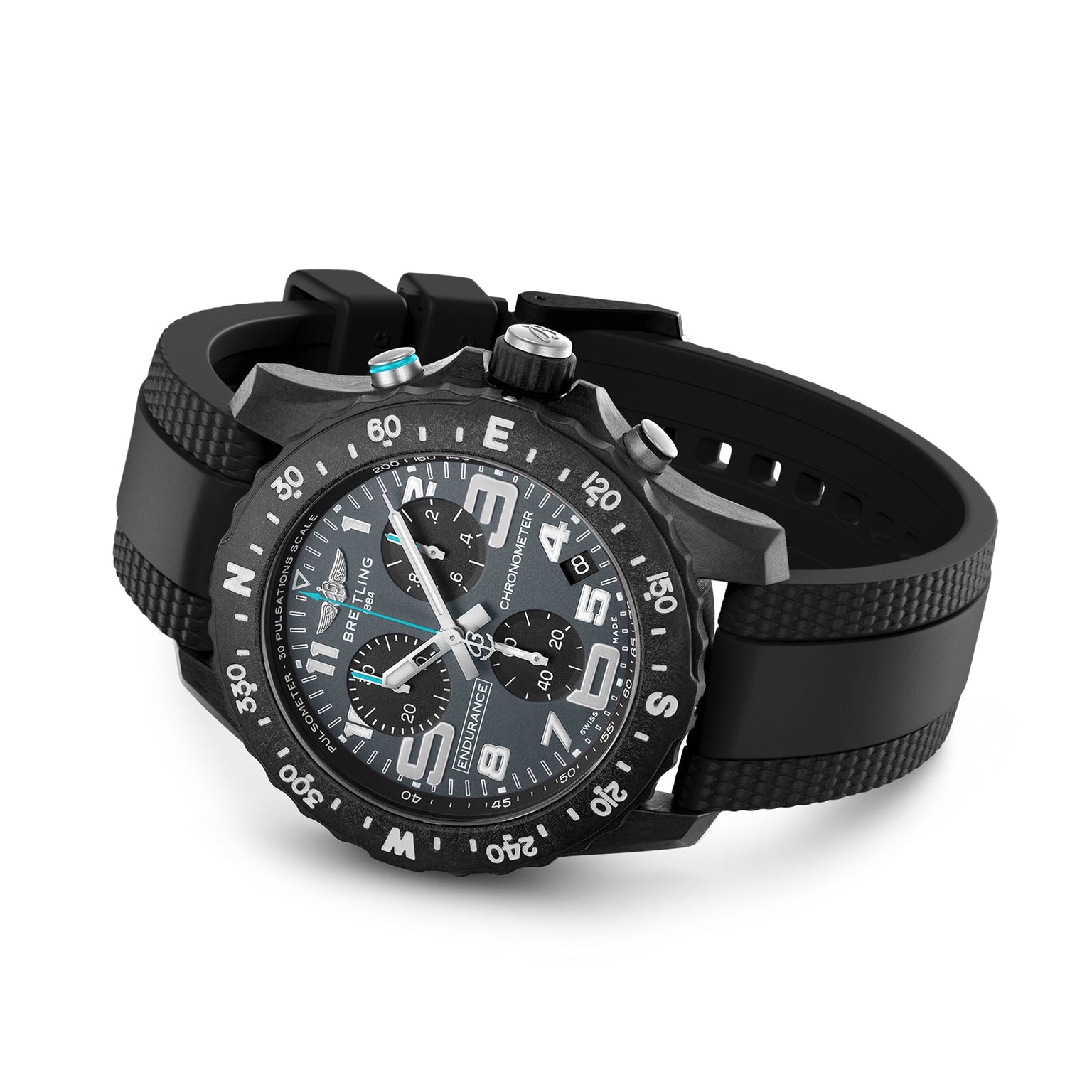 The Breitling Endurance Pro 44 The Watches Of Switzerland Group Exclusive, a black chronograph watch with a rubber strap, bold white numbers, and a compass bezel, is displayed at an angle on a white background.
