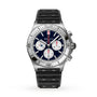 A Breitling Chronomat B01 42 NFL New England Patriots Edition chronograph watch with a silver case, black strap, and blue dial featuring three subdials.