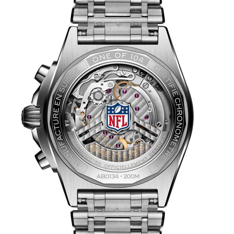 Close-up of a Breitling Chronomat B01 42 NFL Cincinnati Bengals Edition watch back, featuring exposed gears and the NFL logo at the center.