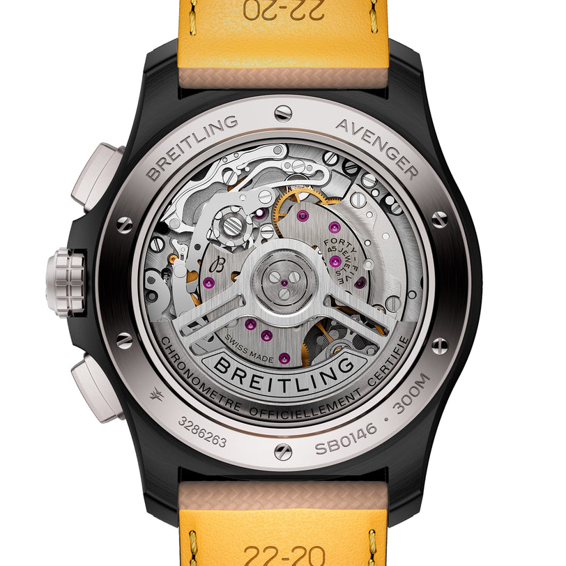 Close-up of the back of a Breitling Avenger B01 Chronograph 42 Night Mission watch, revealing its detailed inner mechanical movement.