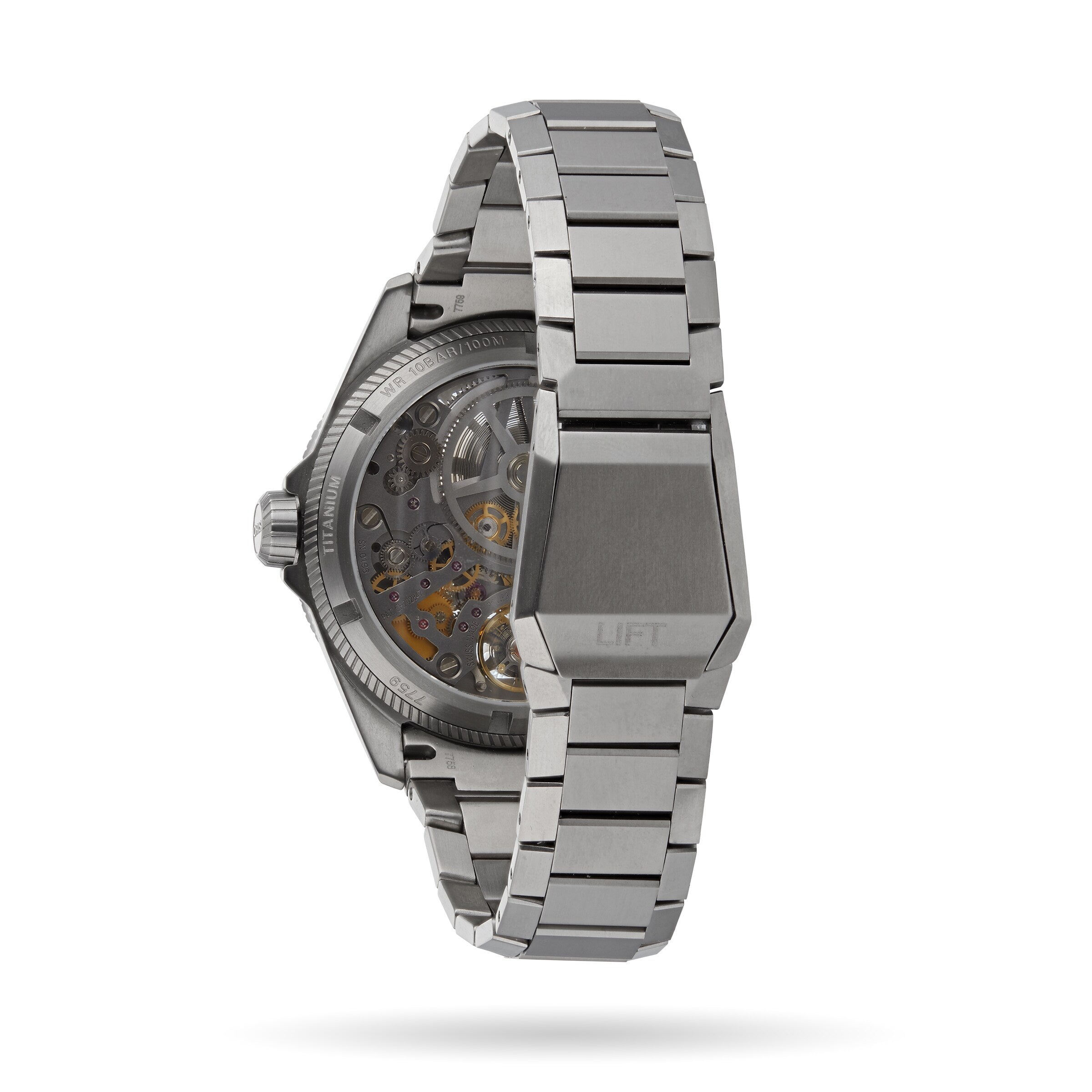 The Oris ProPilot X Calibre 115 is a Swiss Made stainless steel wristwatch with a visible skeleton movement, intricate gears seen from the back and side, and LIFT engraved on the clasp—a mechanical masterpiece.