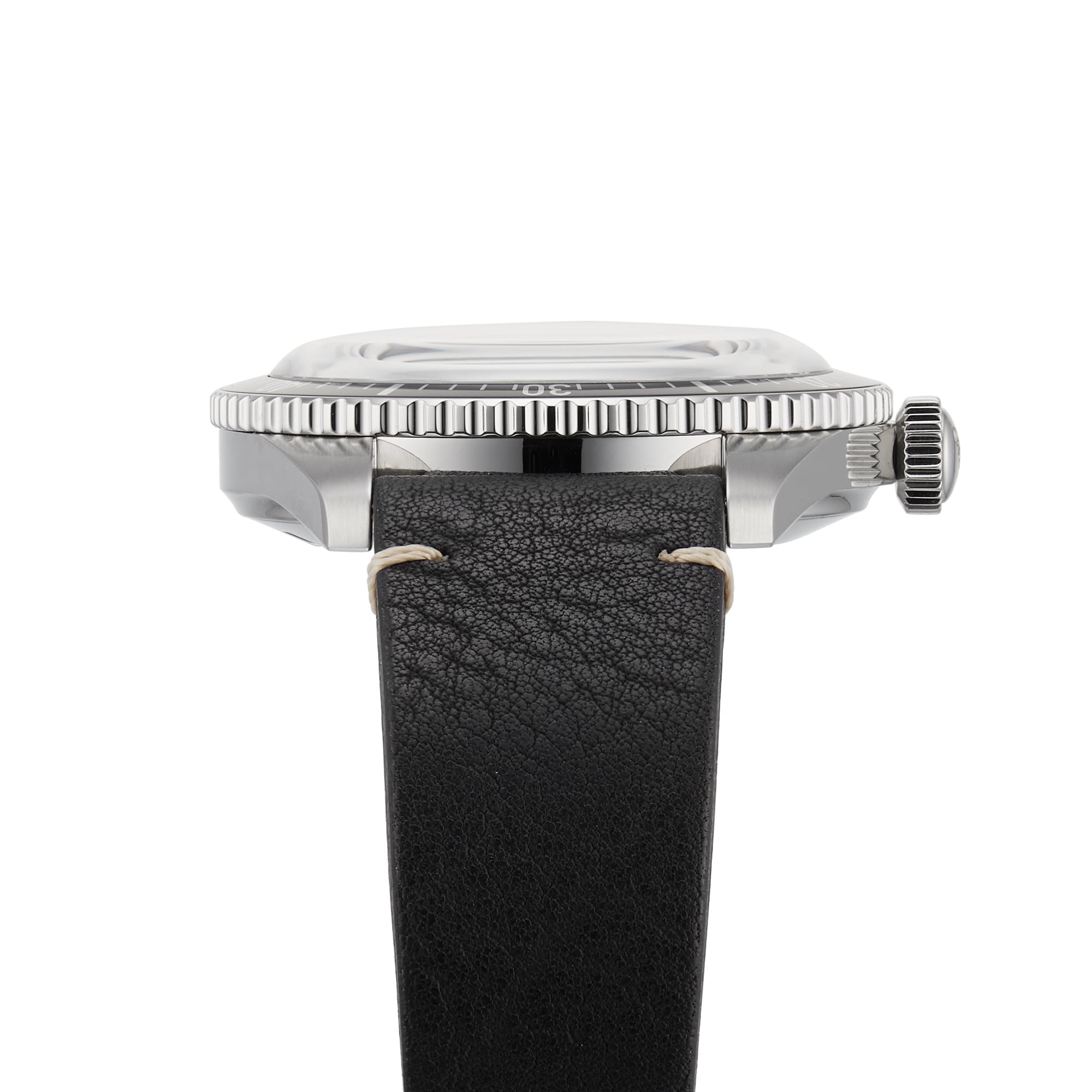 Side view of the Oris Divers Sixty‑Five wristwatch featuring a black leather strap and a silver case with a ridged bezel.