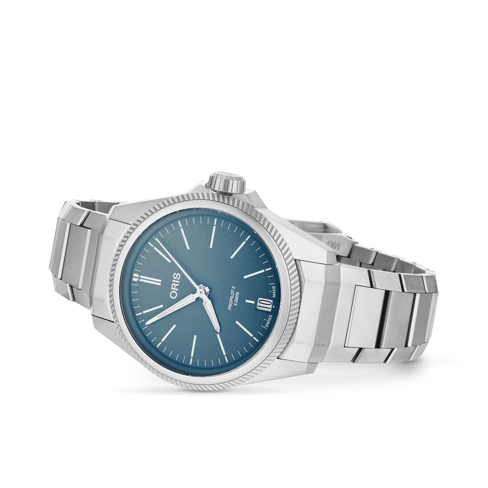 The Oris ProPilot X Calibre 400 is a stainless steel watch with a teal dial, silver hour markers, a date window at 6 o’clock, and Oris branding—showcasing aviation heritage and modern style on a white background.