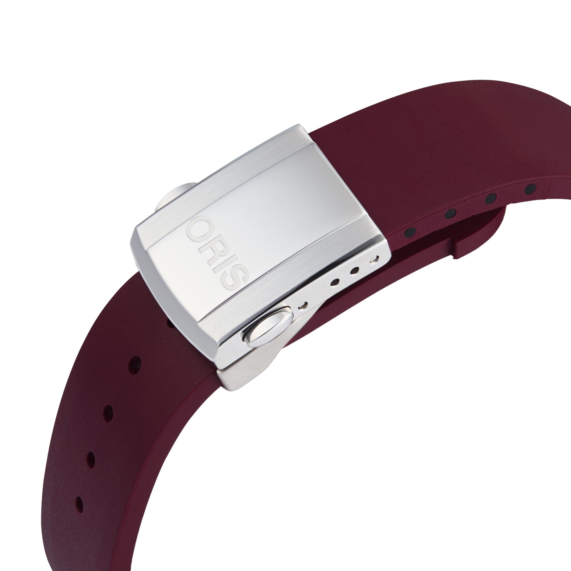 A close-up of a burgundy Oris watch strap with a silver clasp engraved with ORIS, made for the Aquis Date Diamonds collection, shown on a plain white background.