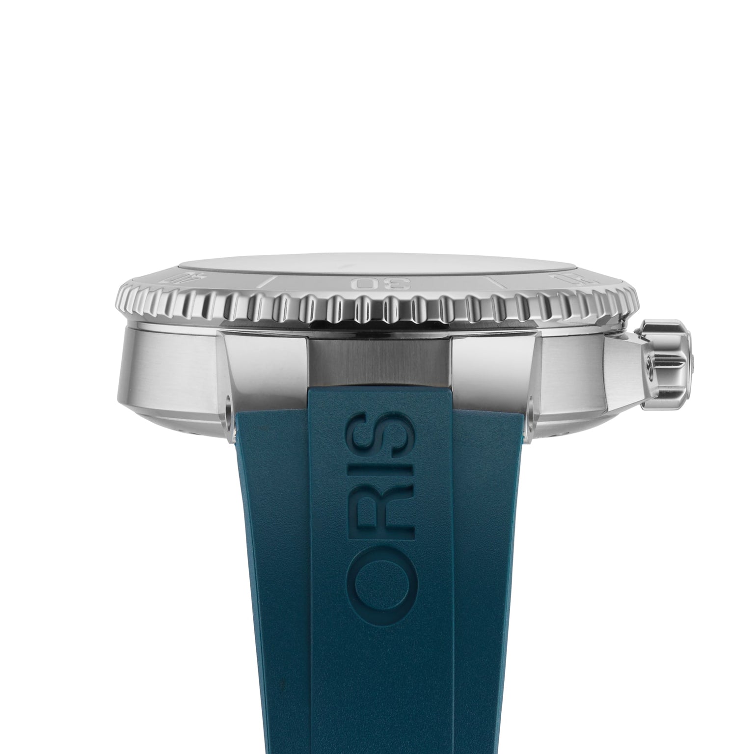 Side view of the Oris Aquis Small Second Date diver’s watch in silver, with a textured bezel and a blue rubber strap embossed with ORIS; Super-LumiNova accents offer excellent low-light readability.