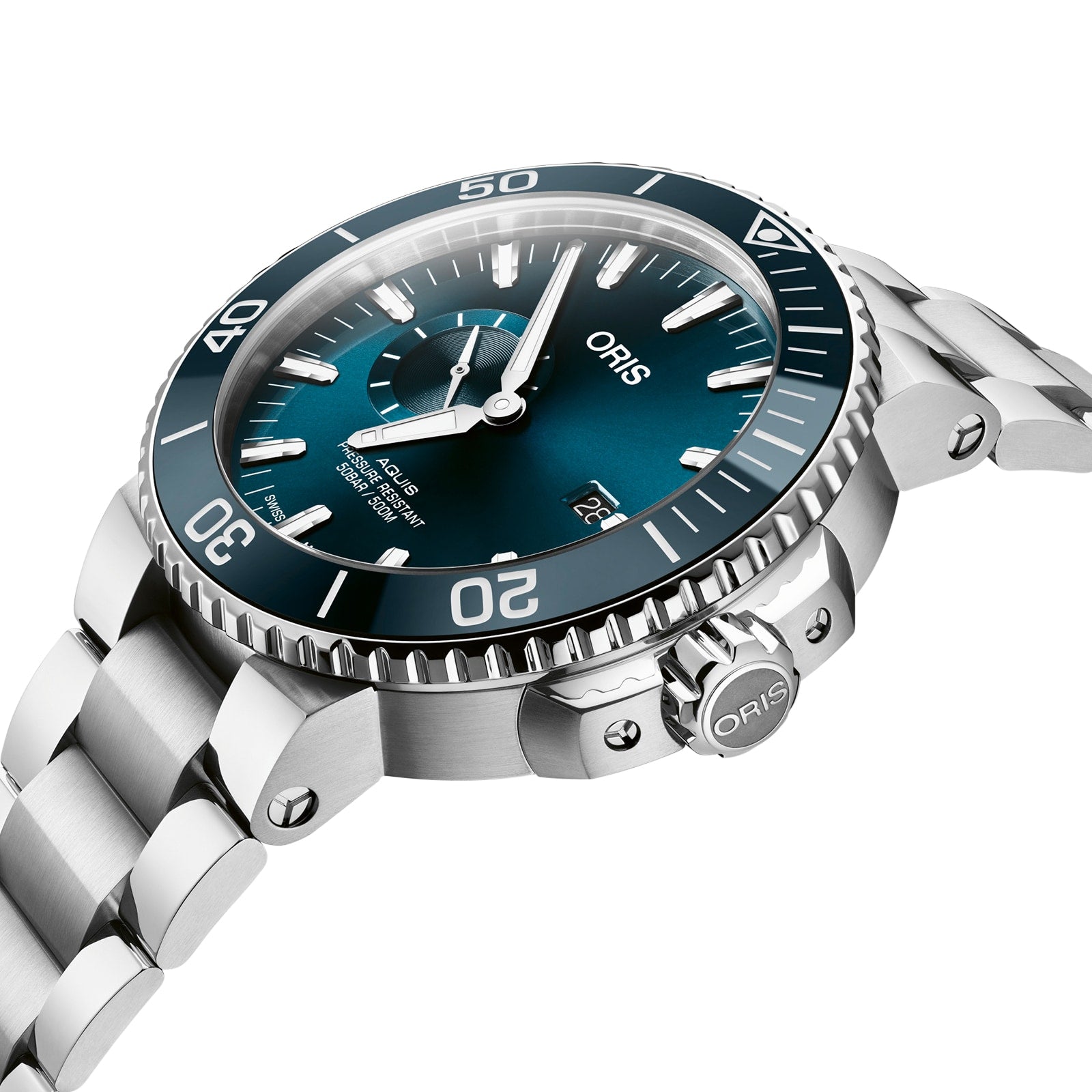 The Oris Aquis Small Second Date diver’s watch features a teal dial, rotating bezel, date display, and stainless steel bracelet. Photographed at an angle, it is water-resistant to 50 bar for reliable underwater performance.