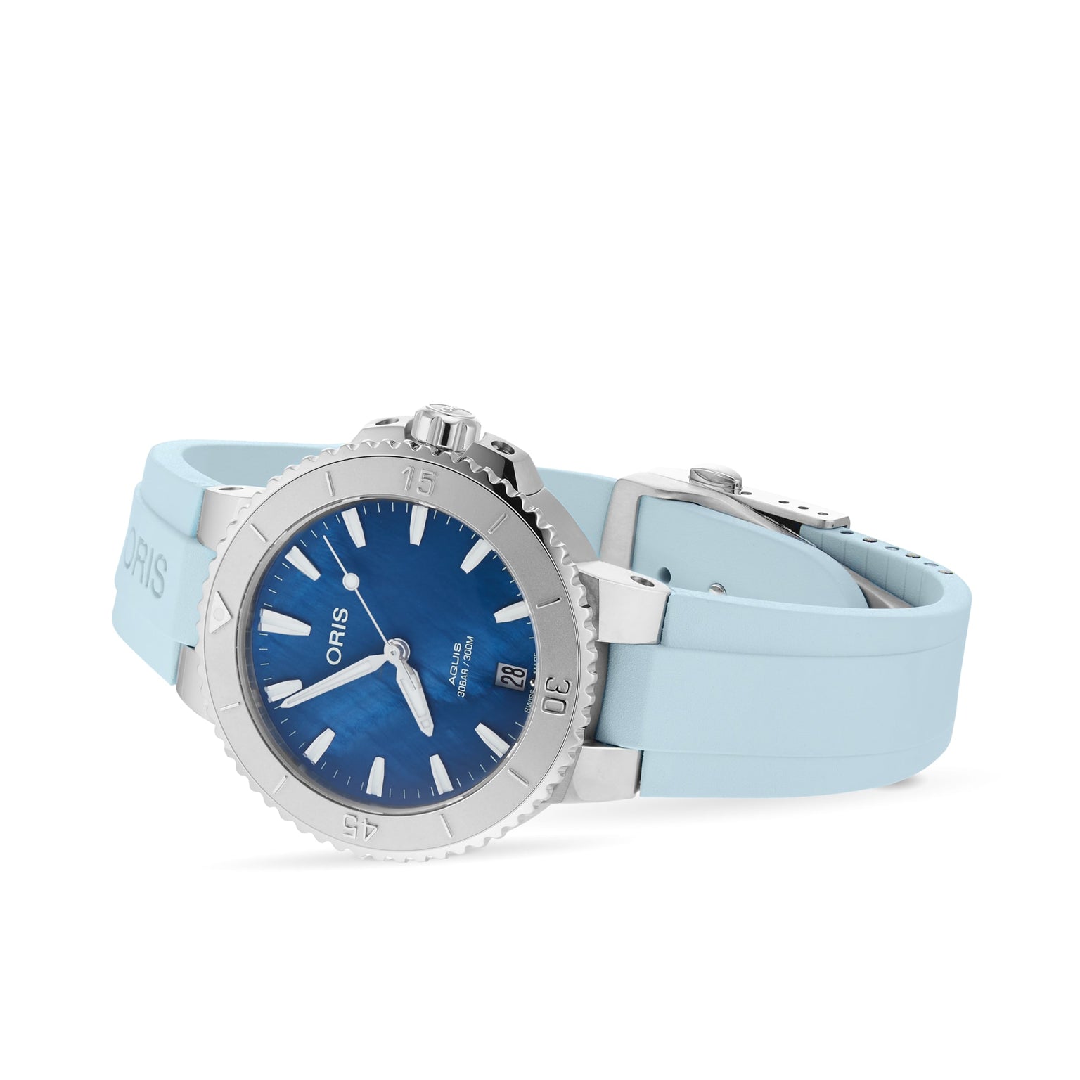 The Oris Aquis Date diver’s watch, featuring a blue dial, date display, and light blue rubber strap, is shown on a white background to highlight its high-performance design.