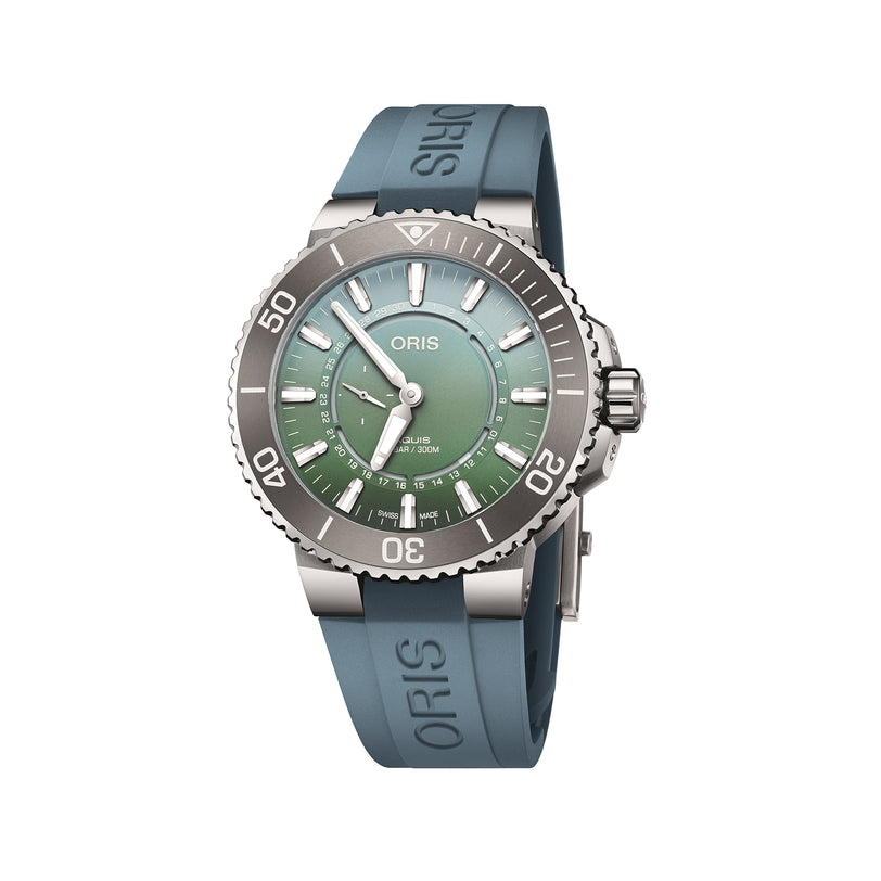 The Oris Dat Watt Limited Edition II features a green dial, silver bezel, and blue rubber strap, inspired by the Wadden Sea. Water resistant to 300m, it’s a tribute to conservation and displays the time at 10:10.