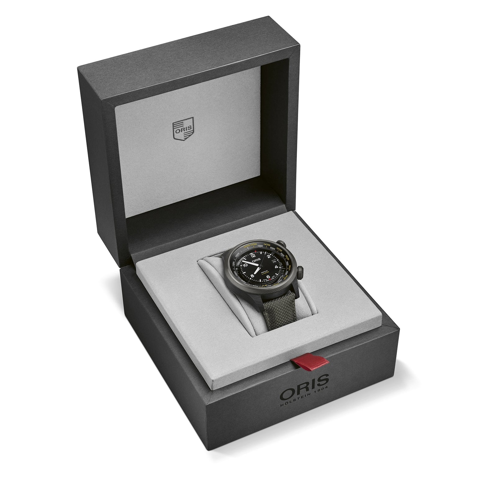 An Oris ProPilot Altimeter wristwatch with a fabric strap and advanced altimeter module, featuring calibre 793, shown in an open grey Oris-branded watch box.
