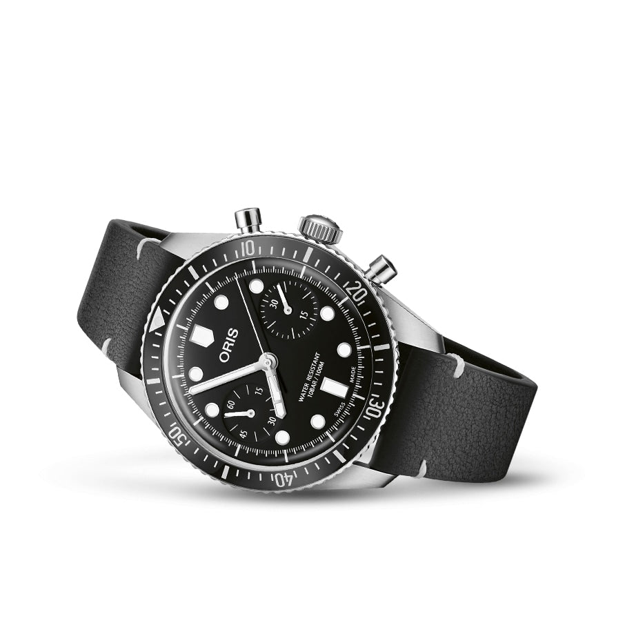 A black and silver Oris Divers Sixty‑Five Chronograph wristwatch with a black leather strap and a chronograph dial displayed on a white background.