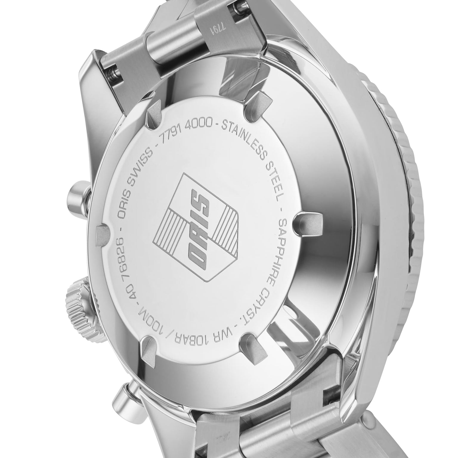 Close-up of the back of an Oris Divers Sixty‑Five Chronograph stainless steel wristwatch, highlighting engraved details and the Oris logo.