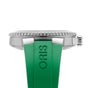 Side view of the Oris Aquis Date Calibre 400 wristwatch, featuring a silver case, ridged bezel, and green ORIS-embossed rubber strap—showcasing the robust style of this mechanical diving watch.
