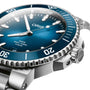 Close-up of the Oris Aquis Date Calibre 400 dive watch, featuring a blue dial, stainless steel case, and rotating bezel.