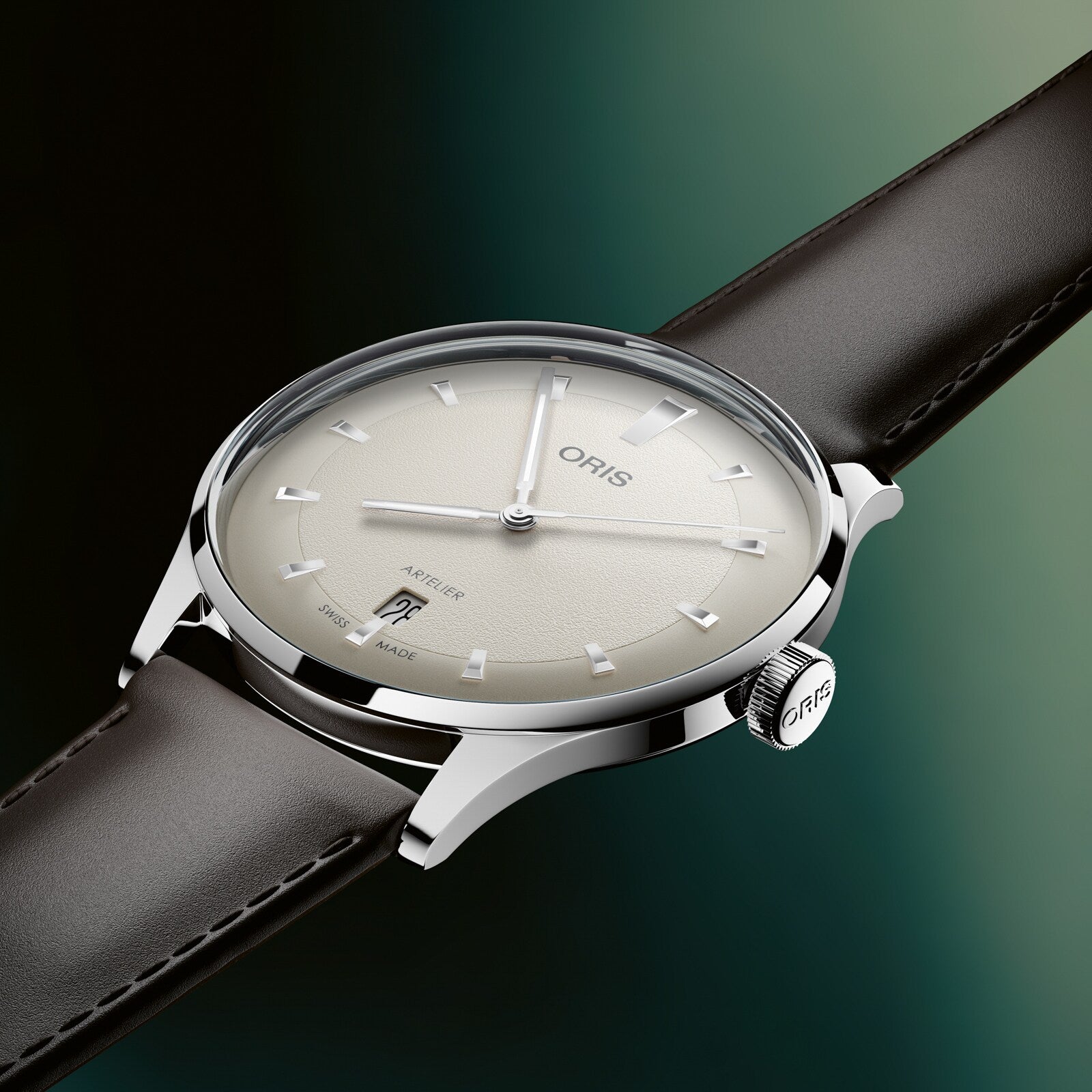 Oris watch with a black leather strap on a gradient green background