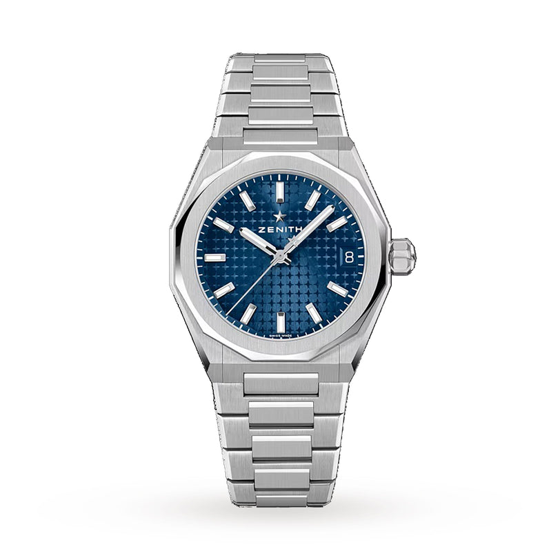 The Zenith Defy Skyline 36 is a stainless steel automatic watch featuring a blue textured dial, silver hour markers, a date window at 3 o’clock, and a metal link bracelet—ideal for urban sophistication.