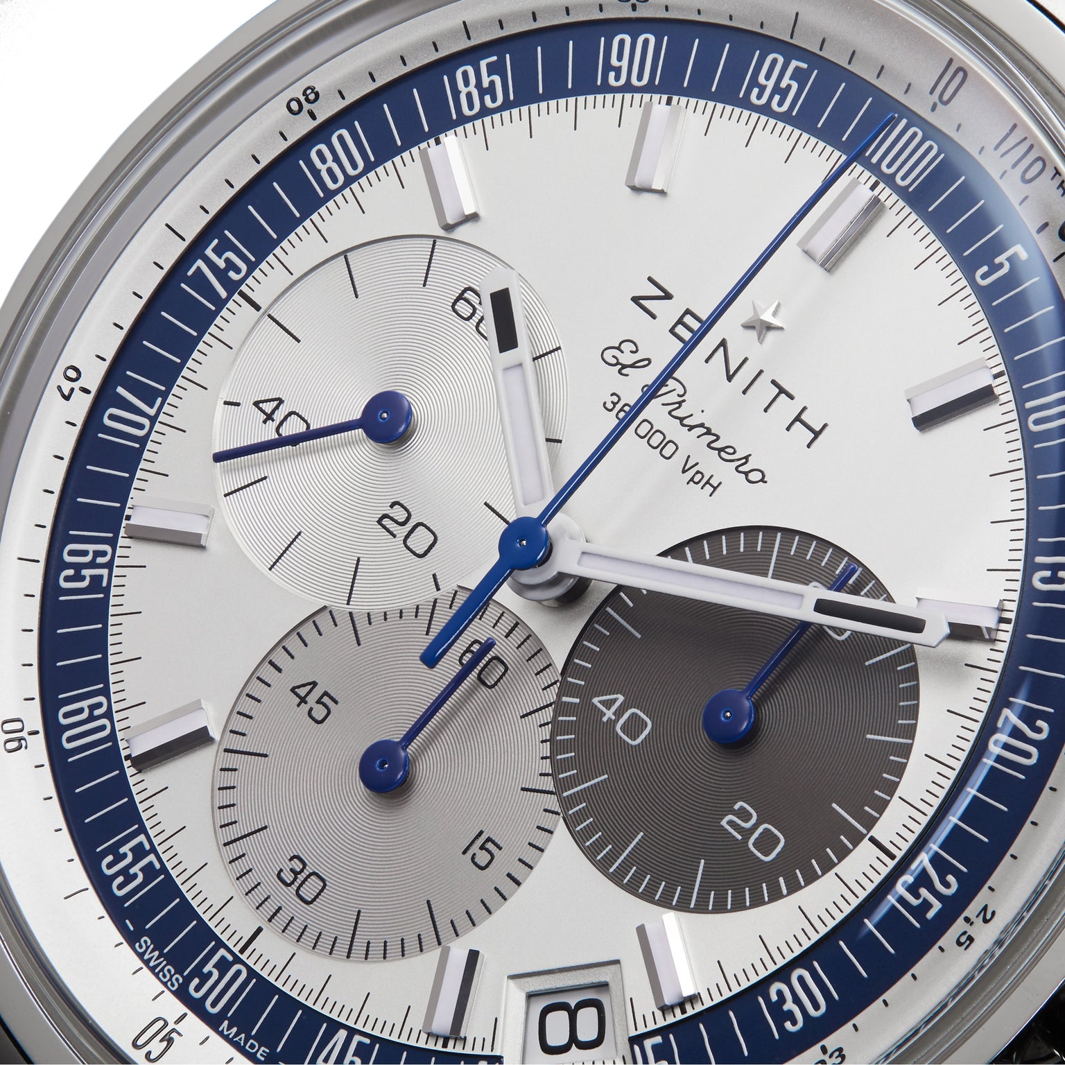 Close-up of a Zenith Limited Edition WOSG Exclusive Chronomaster EP Original watch face with three subdials, blue hands, and a tachymeter scale.