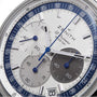 Close-up of a Zenith Limited Edition WOSG Exclusive Chronomaster EP Original watch face with three subdials, blue hands, and a tachymeter scale.