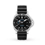 The Panerai Submersible is a 42mm stainless steel men's dive watch with a black dial, luminous markers, date display, and black rubber strap. It features a distinctive crown guard on the right side.