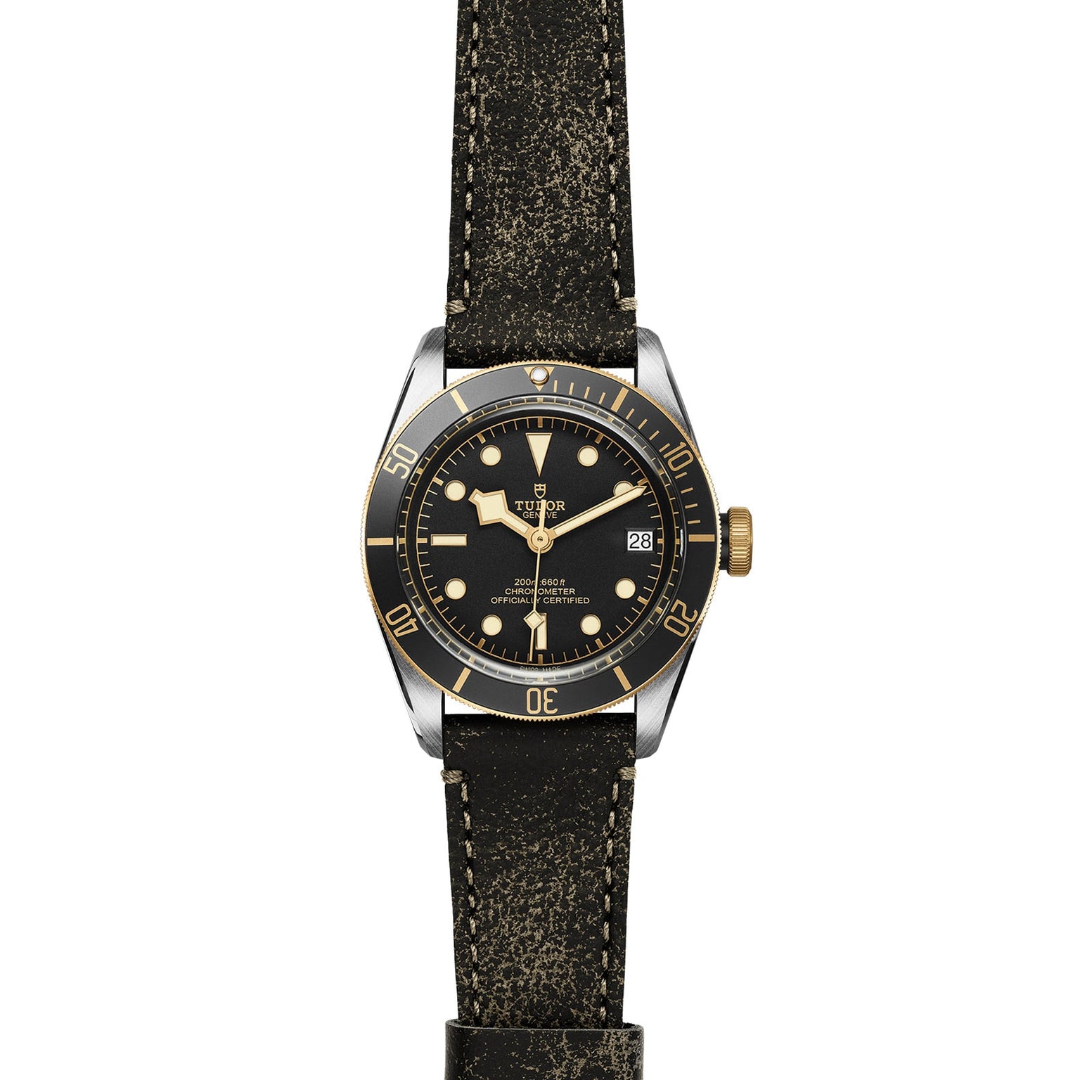 The TUDOR Black Bay S&G wristwatch features a round black and gold dial, date display, distressed black leather strap, and a self-winding mechanical movement, shown against a white background.