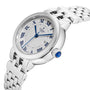 The TUDOR Clair de Rose is a silver wristwatch featuring blue Roman numerals, a date display, and a silver metal link band.