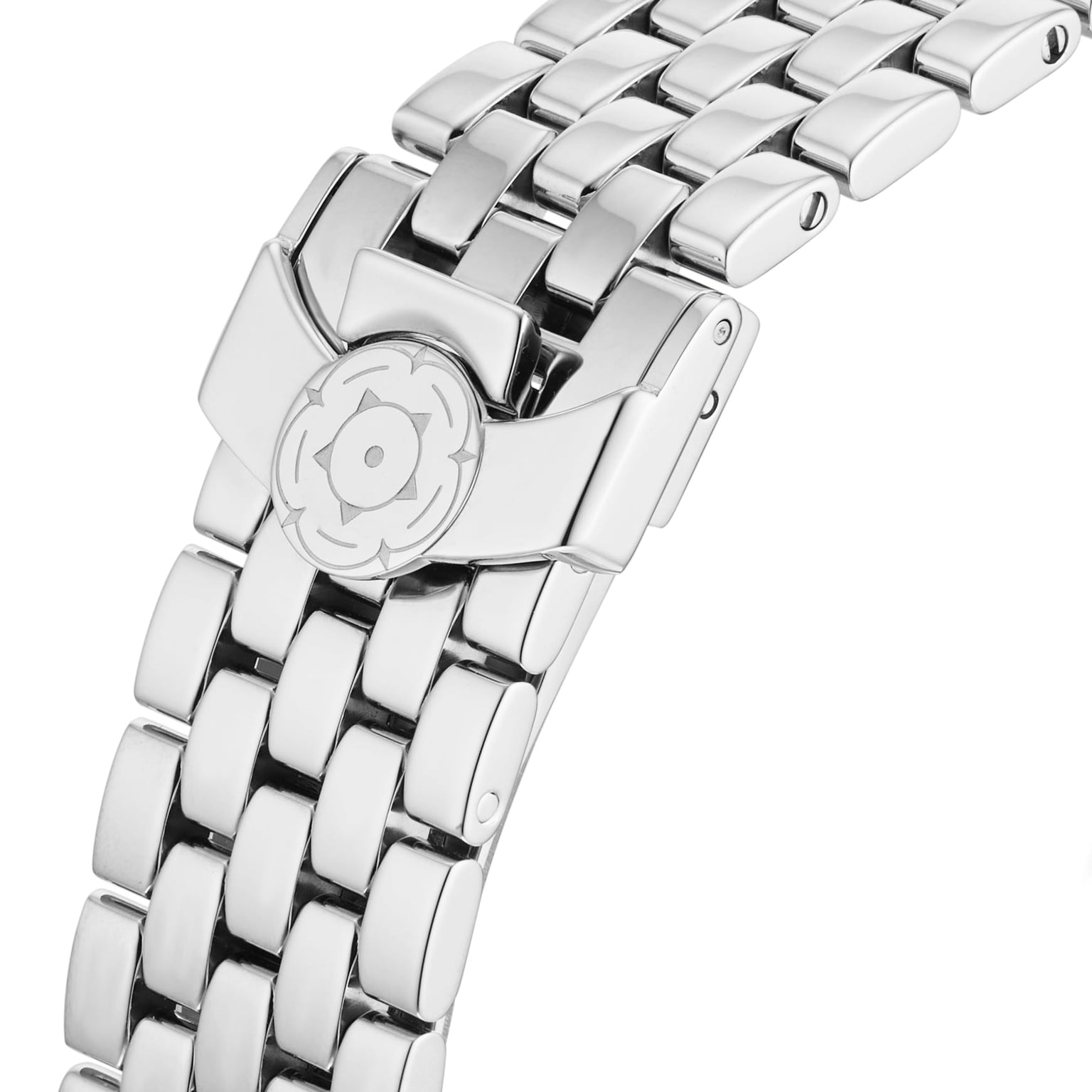 Close-up of a polished silver metal watch band from the TUDOR Clair de Rose, showcasing a decorative clasp with a circular emblem.