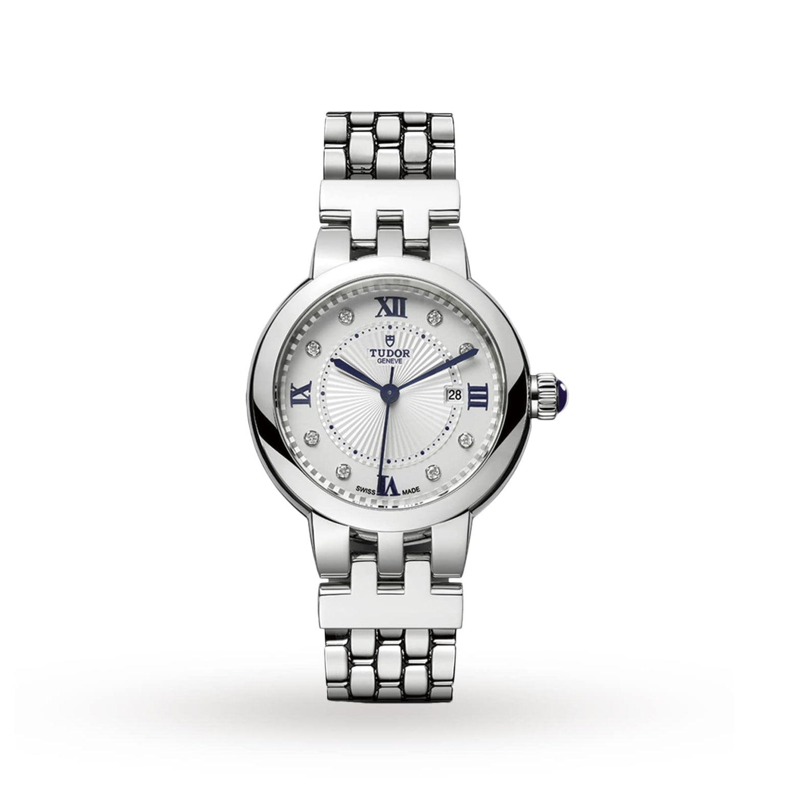 The TUDOR Clair de Rose is a silver wristwatch featuring a round face with Roman numerals, diamond hour markers, and a metal link bracelet.