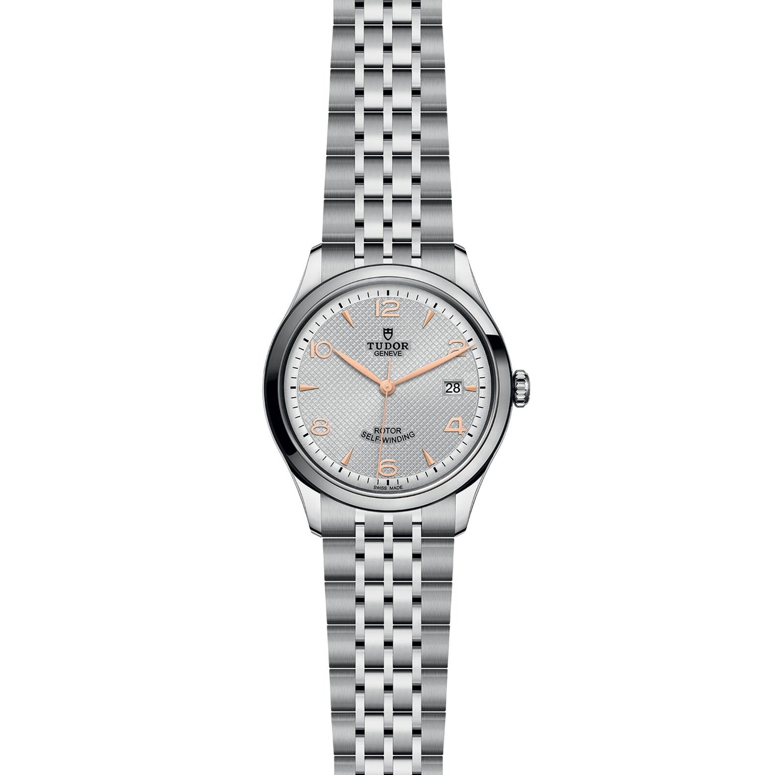 The TUDOR 1926 is a classic stainless steel wristwatch featuring a silver dial with orange hour markers, date display at 3 o’clock, and a five-link bracelet—ideal for fans of elegant mechanical timepieces.