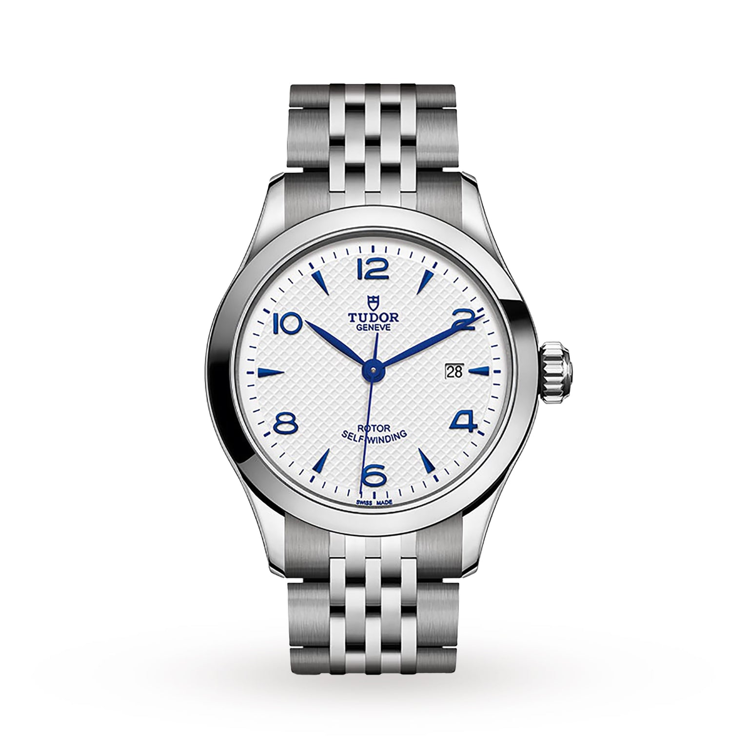 The TUDOR 1926 wristwatch features a silver case, white textured dial with blue markers, a date window at 3 o’clock, and is displayed on a metal link bracelet against a white background—an elegant classic from TUDOR.