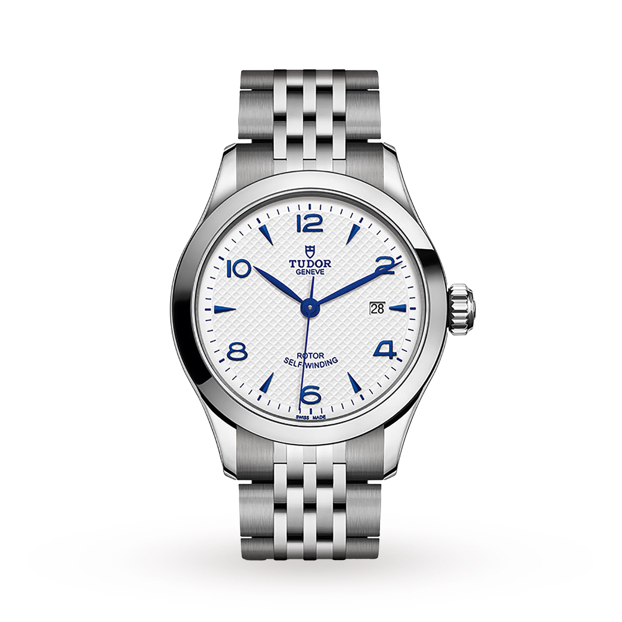 The TUDOR 1926 wristwatch features a silver case, white textured dial with blue markers, a date window at 3 o’clock, and is displayed on a metal link bracelet against a white background—an elegant classic from TUDOR.