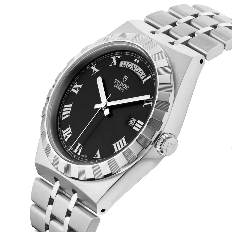 The TUDOR Royal is a stainless steel wristwatch featuring a black dial with Roman numerals, day and date display, and a silver link bracelet—an automatic sport-chic timepiece combining elegance and cutting-edge performance.