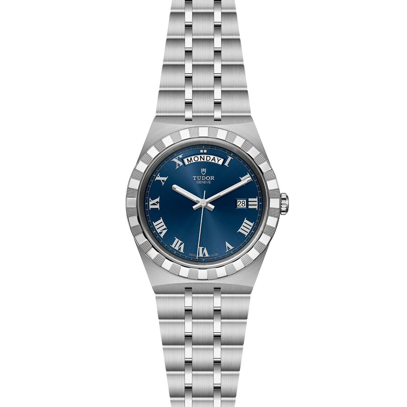 The TUDOR Royal is a stainless steel wristwatch with a blue dial, Roman numerals, day at 12 o’clock, date at 3 o’clock, and an integrated bracelet—an automatic watch combining sport-chic style, elegance, and versatility.