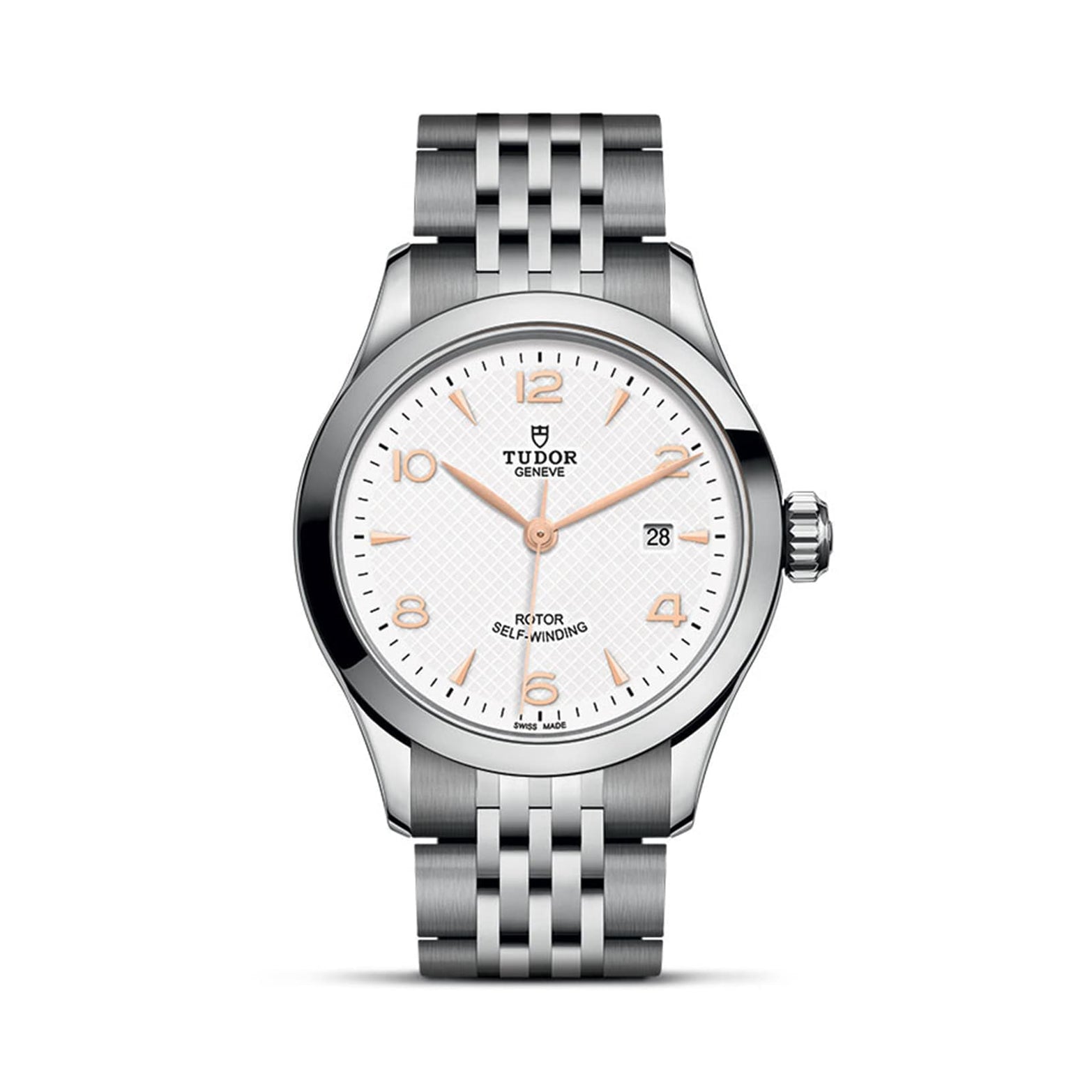 The TUDOR 1926 is a classic, elegant stainless steel wristwatch featuring a white dial, gold hour markers, date at 3 o’clock, and a metal bracelet—capturing the timeless appeal of TUDOR.