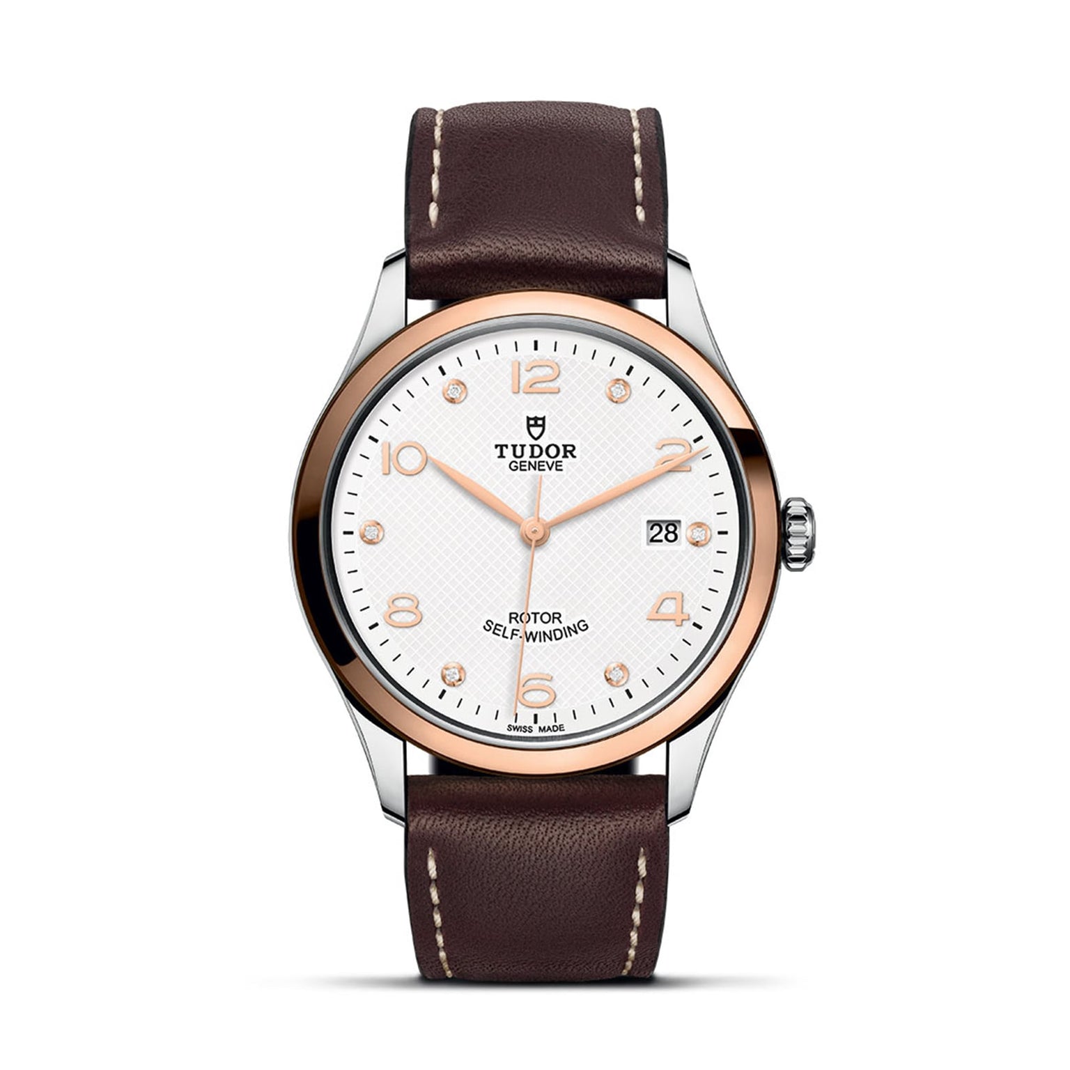 The TUDOR 1926 is a classic, elegant wristwatch featuring a white dial, gold-tone bezel, brown leather strap, date at 3 o’clock, and Rotor Self-Winding text above 6—ideal for mechanical watch enthusiasts.