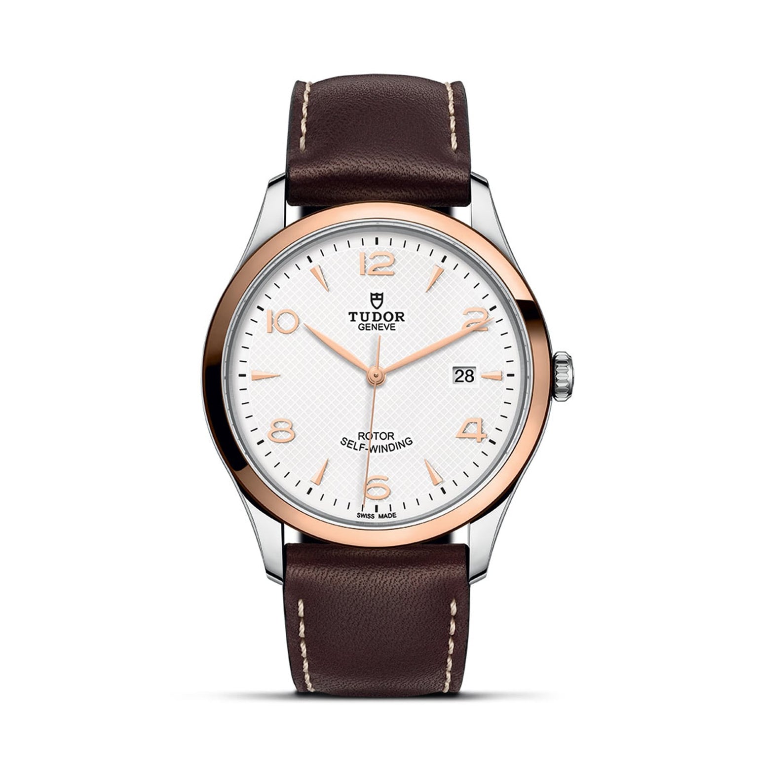 The TUDOR 1926 wristwatch features a white textured dial, gold hour markers, date display at 3 o’clock, and a brown leather strap with white stitching—a timeless choice for classic watch enthusiasts.