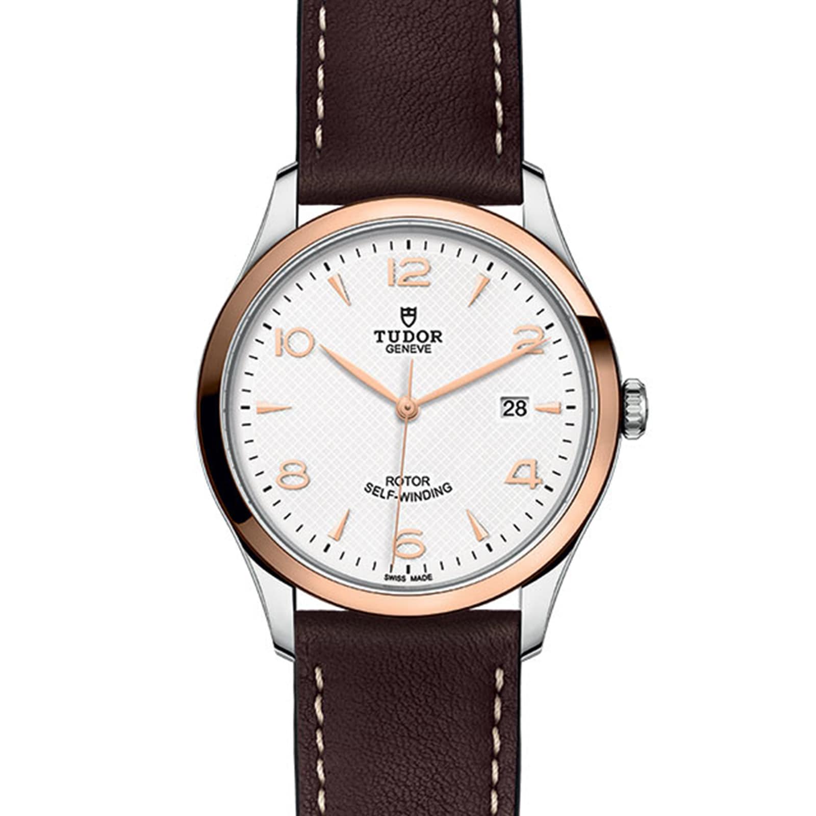The TUDOR 1926 wristwatch features a brown leather strap, white dial, gold markers, and a date display at 3 oclock.
