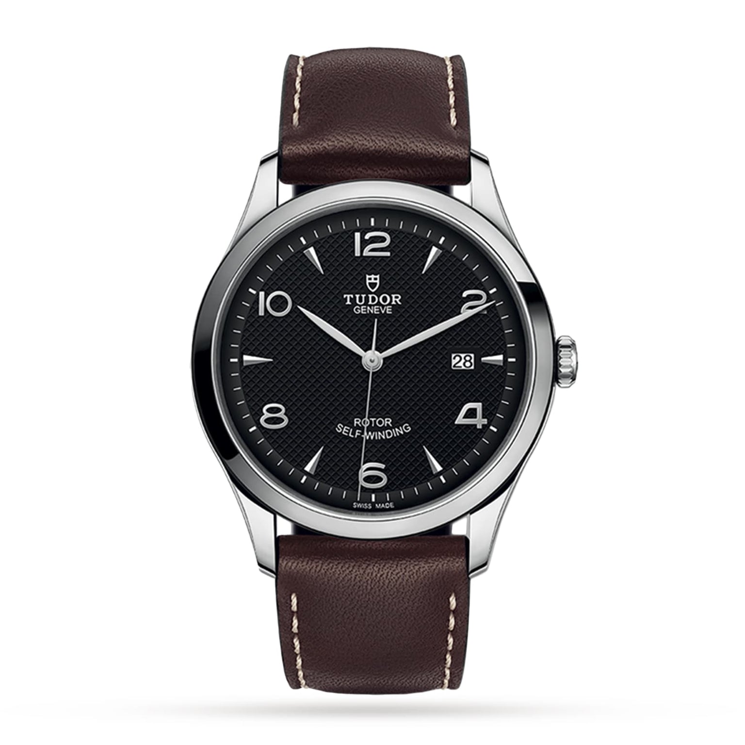 The TUDOR 1926 features a black textured dial, silver-tone indices and hands, date window at 3 o’clock, sapphire crystal, and a brown leather strap with white stitching.