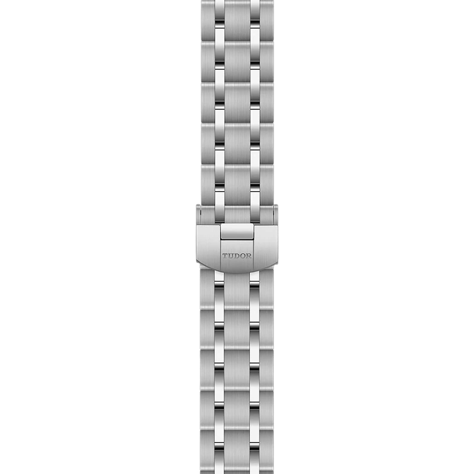 The TUDOR Royal watch features a stainless steel bracelet with a five-link design and branded clasp, displayed from a top-down perspective.