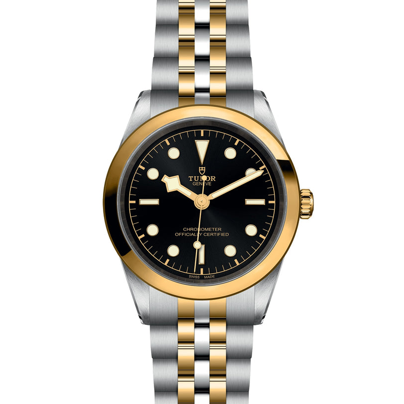 The TUDOR Black Bay One 41 S&G features a black dial, gold bezel, and two-tone silver and gold bracelet, displaying 10:10—a standout in TUDOR’s modern collection.