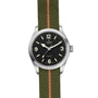 The TUDOR Ranger features a black dial with white numerals and an olive green jacquard strap with a bold red stripe, powered by the robust MT5402 movement.