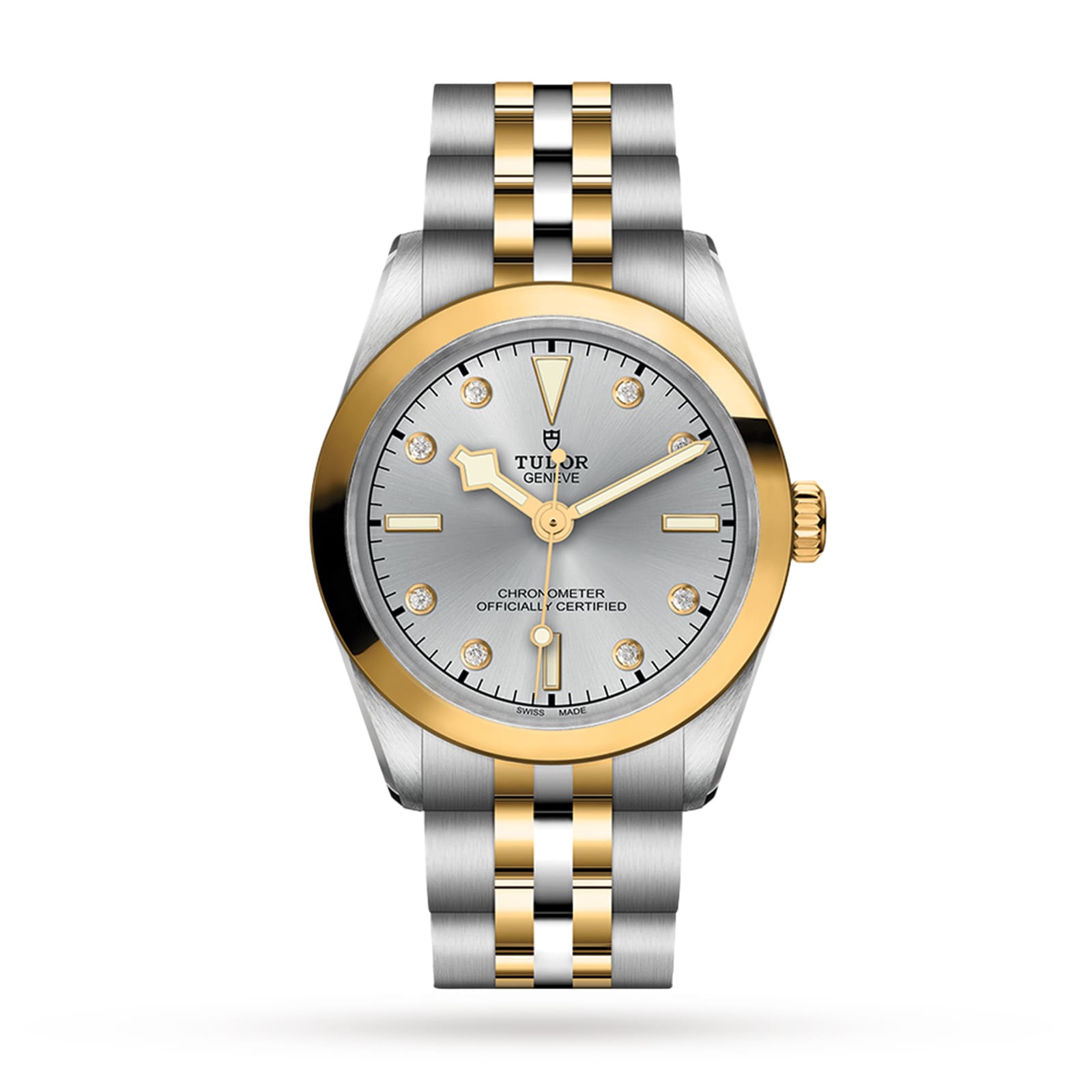 The TUDOR Black Bay One 31 S&G, featuring a silver dial, gold bezel, gold hour markers, and a steel & gold bracelet, is displayed on a white background, showcasing the refined elegance of TUDOR divers’ watches.