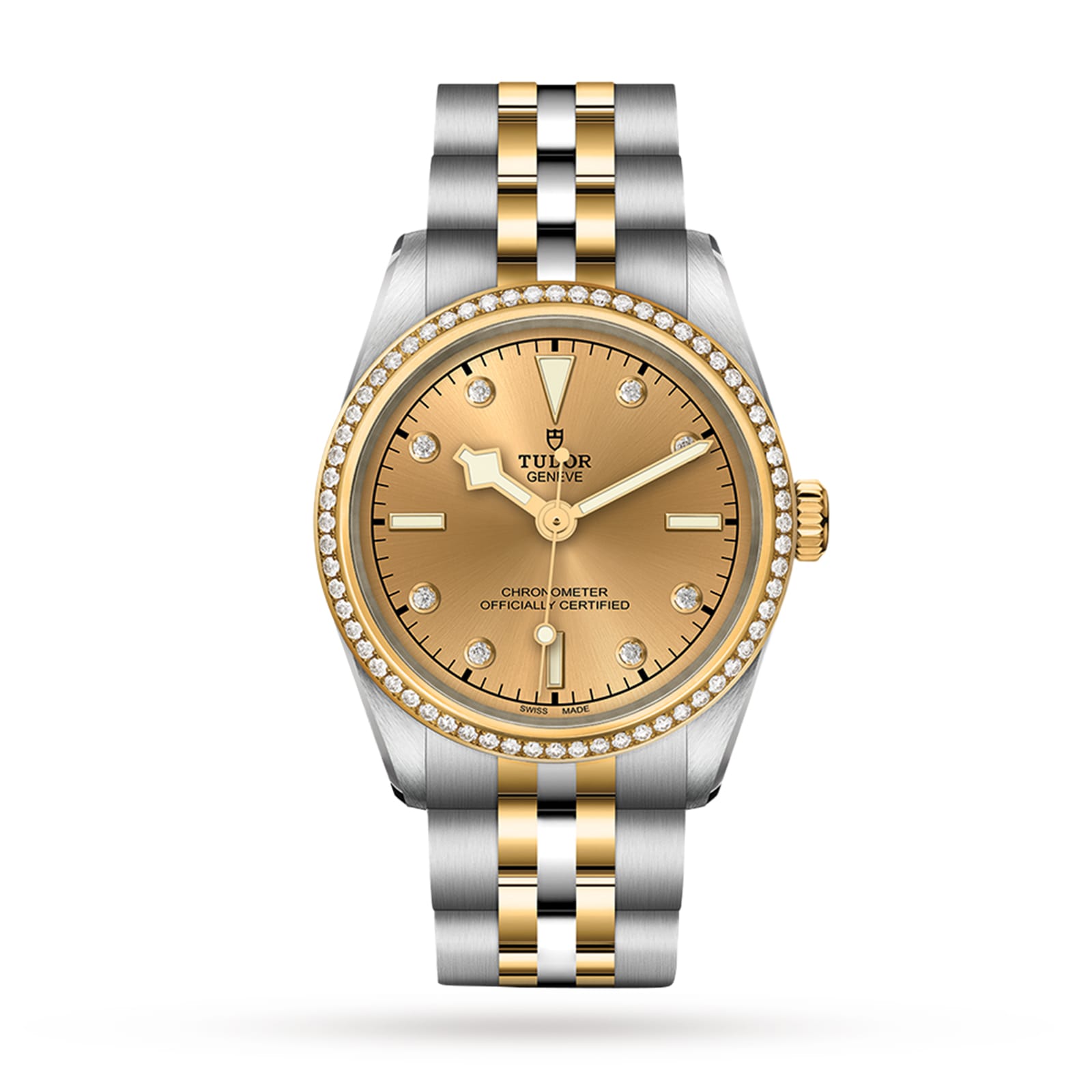 The TUDOR Black Bay One 31 S&G watch features a gold dial, diamond hour markers, and a diamond-set bezel, inspired by Black Bay divers’ watches, shown on a white background.