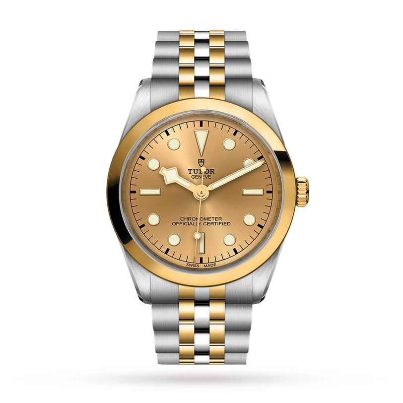 The TUDOR Black Bay One 36 S&G is a two-tone wristwatch with a steel & gold bracelet, gold bezel, and champagne dial featuring simple hour markers and three hands.